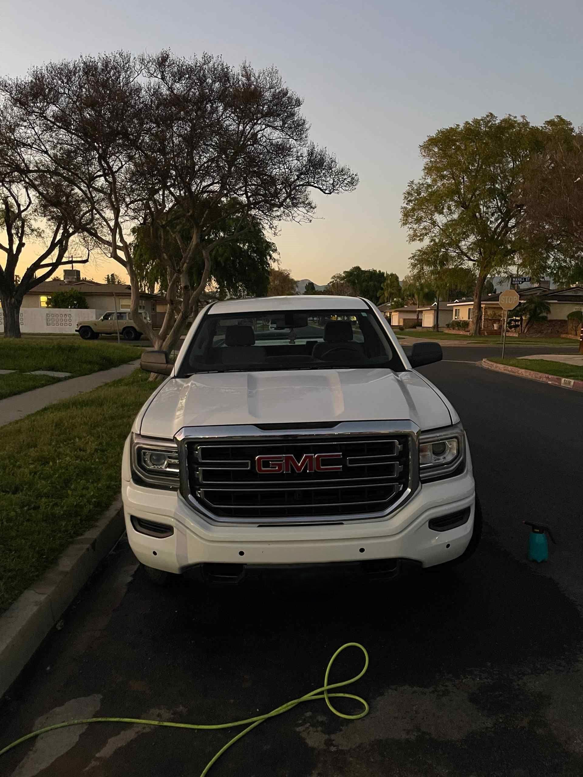 White GMC truck exterior hand wash wax tire dressing mobile detailing Burbank CA
