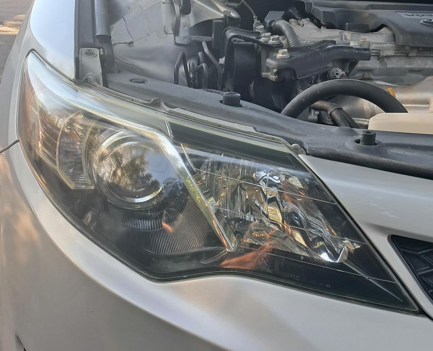 Clear Toyota Camry headlight after restoration